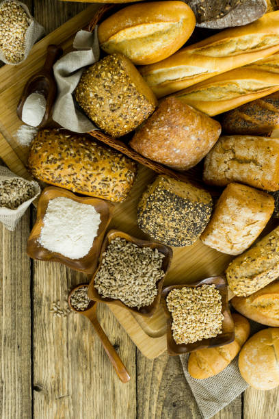 istock Many mixed breads and rolls shot from above. Bakery Background 699147816