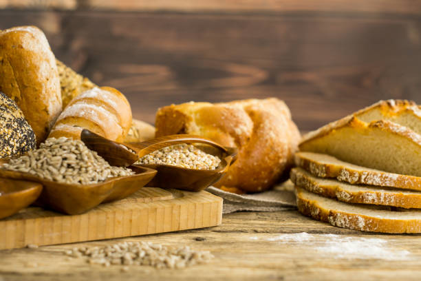 istock Many mixed breads and rolls shot from above. Bakery Background 699147840