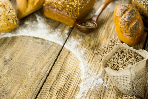 istock Many mixed breads and rolls shot from above. Bakery Background 699147884