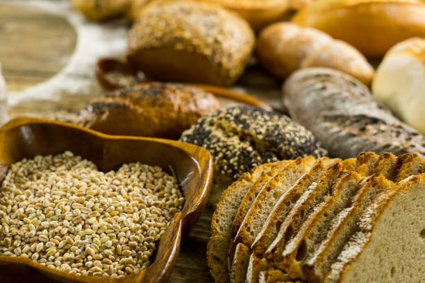 istock Many mixed breads and rolls shot from above. Bakery Background 699147910