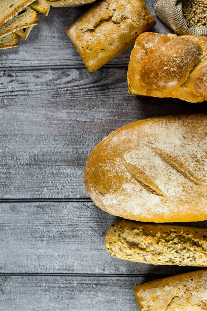 istock Many mixed breads and rolls shot from above. Bakery Background 699147926