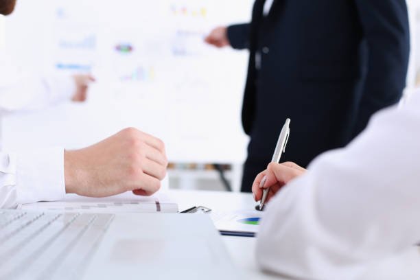 istock Training the employee with the help of third-party hired lecturers to help solve problems and responsibilities 699162792