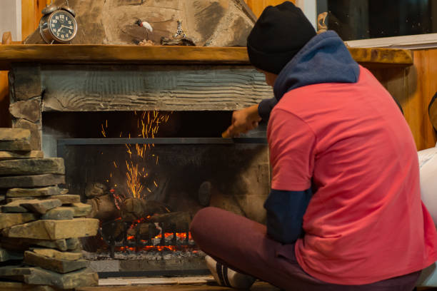istock Teenage boy in the fireplace 699174378