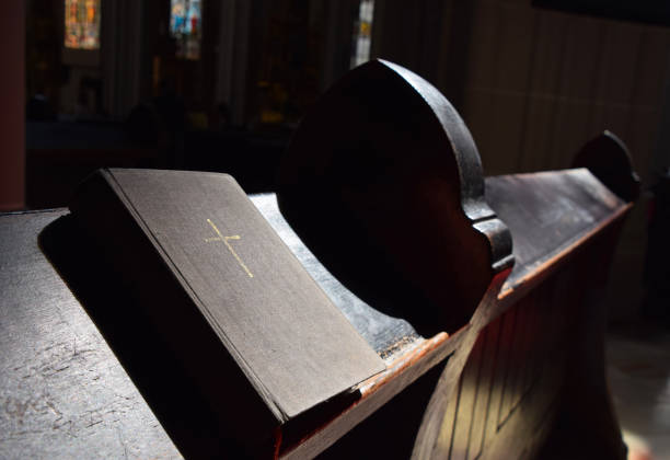 istock Bible On Pew In Church 699181281