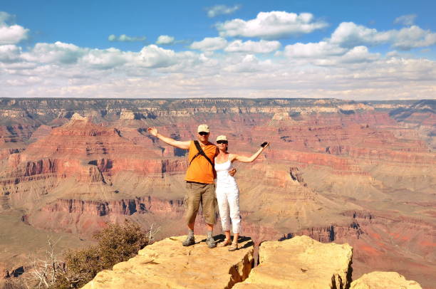 istock People look out on the Grand Canyon 699196792
