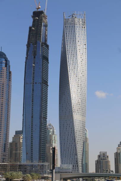 istock Low Angle View Of Skyscrapers Against Clear Blue Sky 699218741