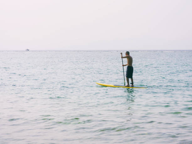 istock Paddle boarding Adventure in Okinawa Japan 699221760