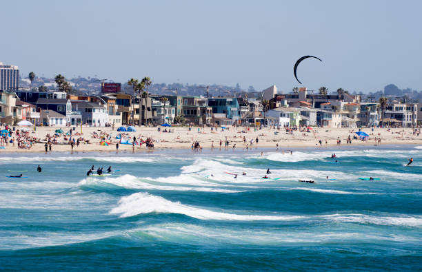 Kiteboarding at Pacific Beach, San Diego, California Kiteboarding at Pacific Beach, San Diego, California kite sailing stock pictures, royalty-free photos & images