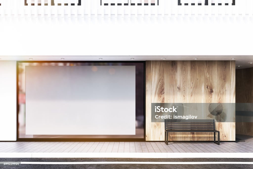 Shop window, poster, bench, white, toned Shop window with a large horizontal poster, a bench and a white balcony on the second floor. Concept of promotion. 3d rendering, mock up, toned image Template Stock Photo