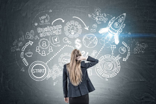 istock Woman scratching head and start up 699238912