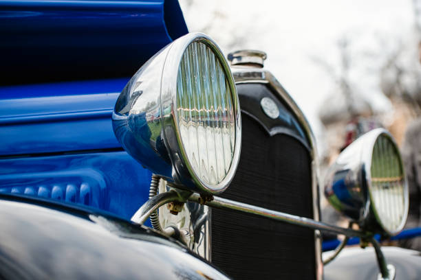istock Headlights an old car with a shallow depth of field 699241504