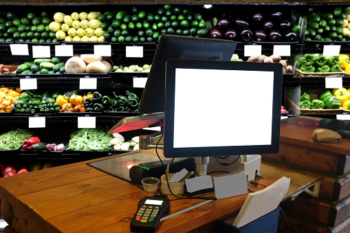 Cash desk with payment terminal in Organic Food Store