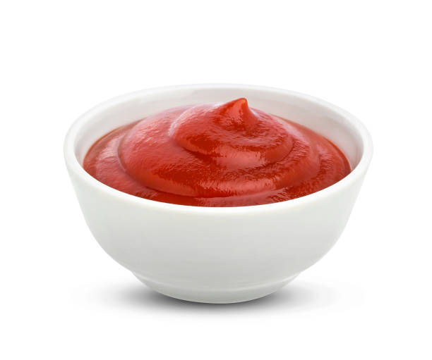 ketchup in bowl isolated on white background. portion of tomato sauce. with clipping path. one of the collection of various sauces - tartar sauce imagens e fotografias de stock