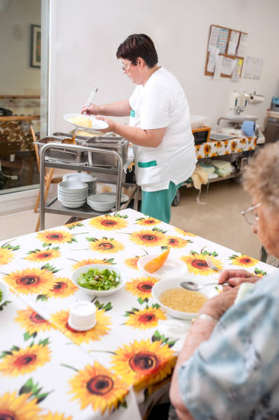 istock Lunch Time For Seniors In The Nursing Home 699269252