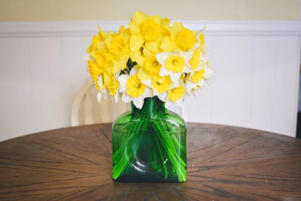 istock Buttercups in green vase 699283210