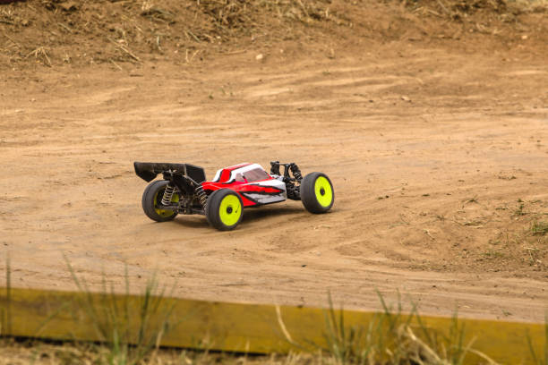 istock Radio controlled car model in race on dirt track 699288030