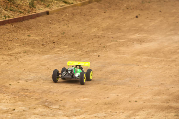 istock Radio controlled car model in race on dirt track 699290210