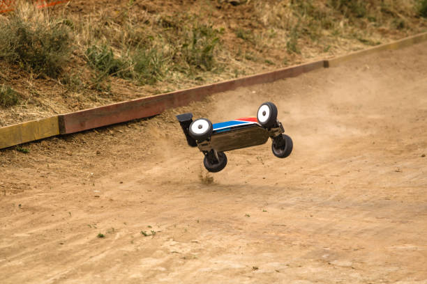istock Radio controlled car model in race on dirt track 699295074