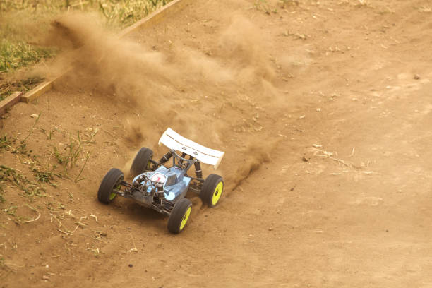 istock Radio controlled car model in race on dirt track 699295612
