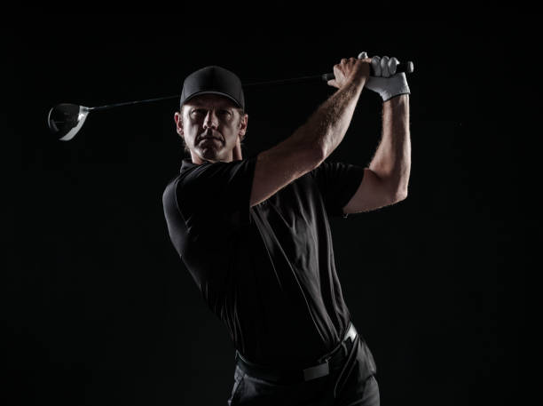 istock Dramatic Image Of A Male Golfer In Mid Swing 699336548