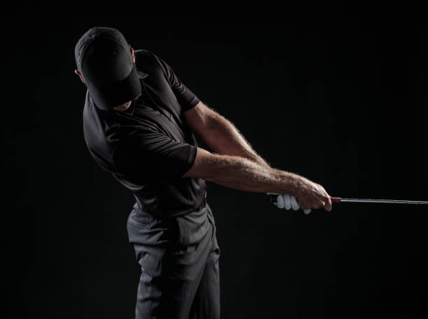 istock Dramatic Image Of A Male Golfer In Mid Swing 699336630