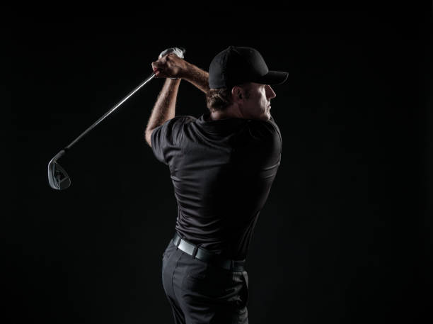 istock Dramatic Image Of A Male Golfer In Mid Swing 699337484
