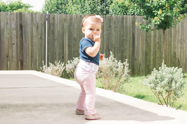 istock American Baby Learning to Walk in Backyard Austin Texas USA 699363198