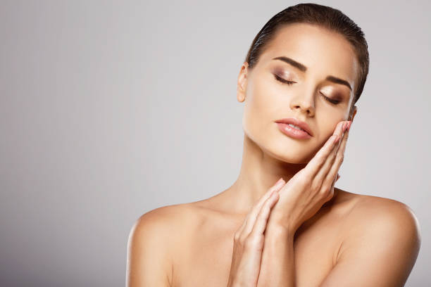 istock Girl with nude make up at studio 699474320