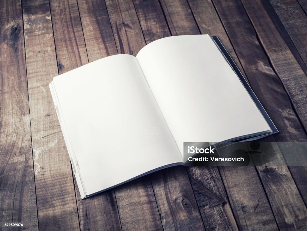 Blank open book Blank open book, brochure or magazine on vintage wooden table background. Mock-up for graphic designers portfolios. Responsive design mockup. Open Stock Photo