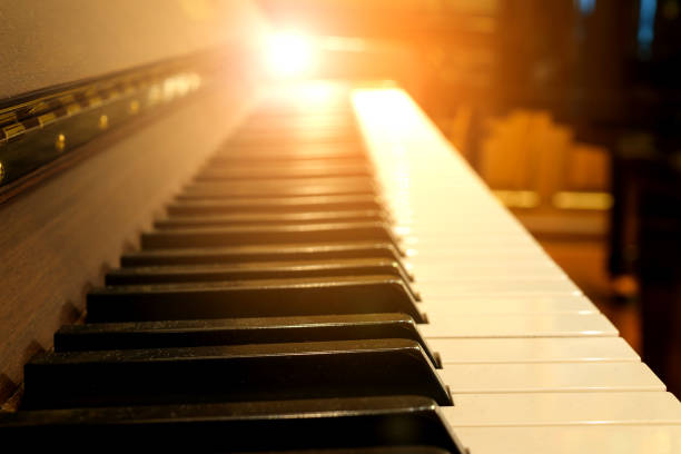 Piano keys on wooden musical instrument