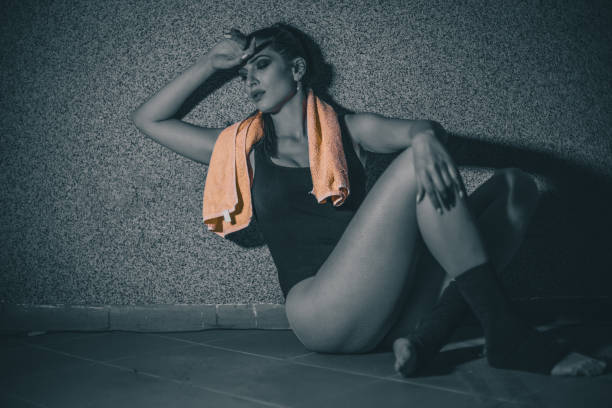 istock Beautiful dancer exercising at the gym 699558866