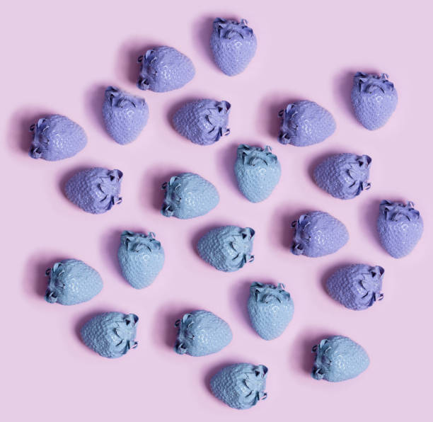 istock Purple and blue painted strawberries 699564970