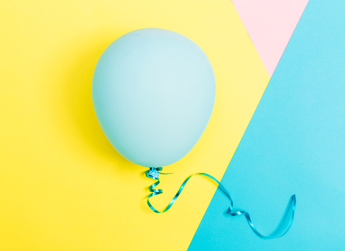 Party theme with balloon on a vibrant colored background