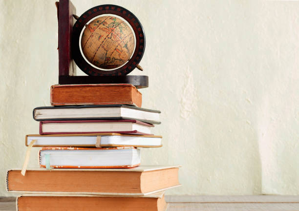 istock books on a wooden. 699661468