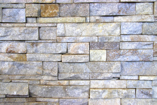 istock pattern of modern style design decorative uneven cracked real stone wall surface with cement 699686810