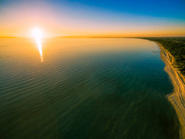 istock Beautiful sunset high above ocean and coastline 699716576