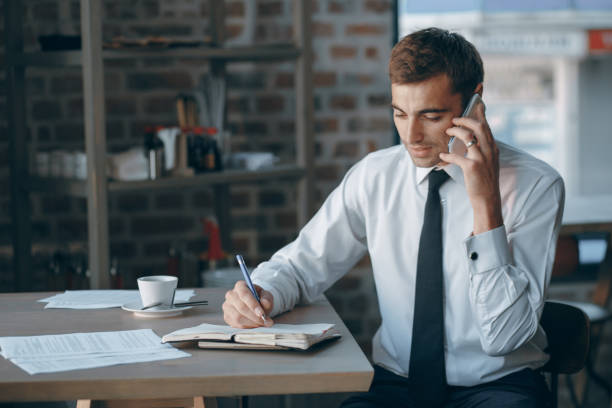 istock businessman in cafe 699721106