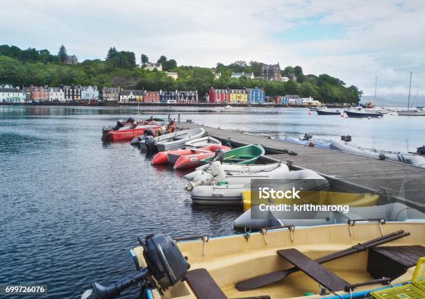 Multicolored Motor Rubber Boats On Tobermory Town Background Stock Photo - Download Image Now