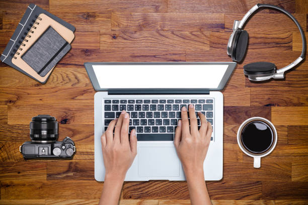 istock Hand working  business on the wooden table  top view 699729768