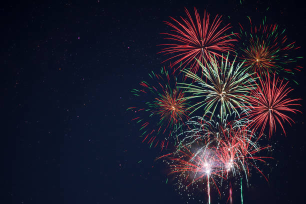 istock Sparkling red green yellow fireworks 699733914