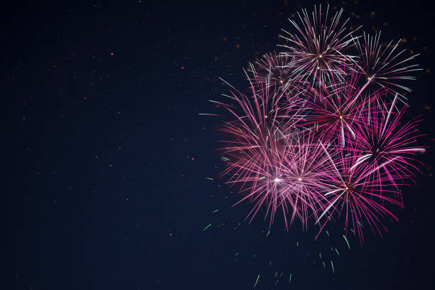istock Amazing maroon red pink celebration fireworks 699733932