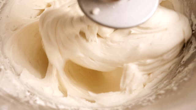 Slow Motion Pastry Cream Whipped by an Electric Mixer - 4K