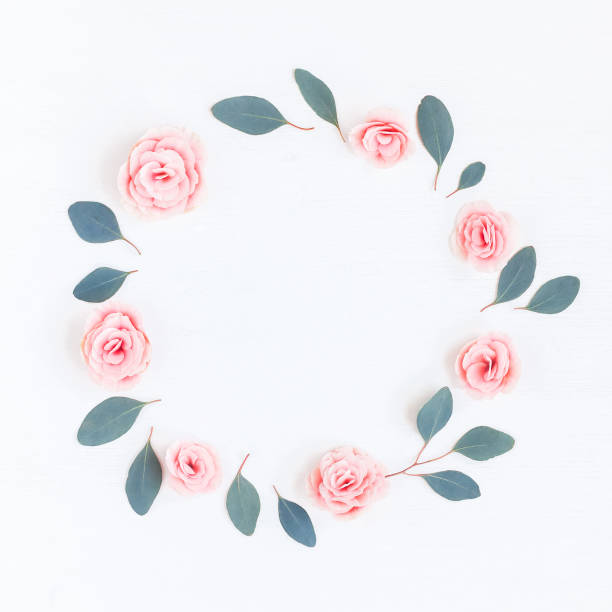 istock Wreath, pink rose flowers, eucalyptus leaves. Flat lay, top view 699781820