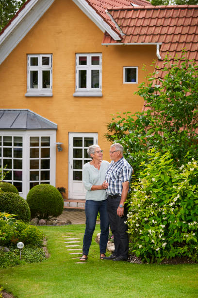 istock Retired couple's estate with park like garden 699794232