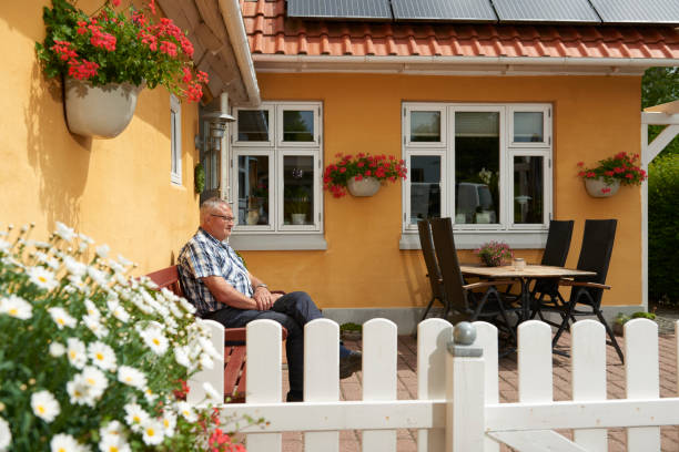 istock Retired man's estate enjoying the terrasse 699795094