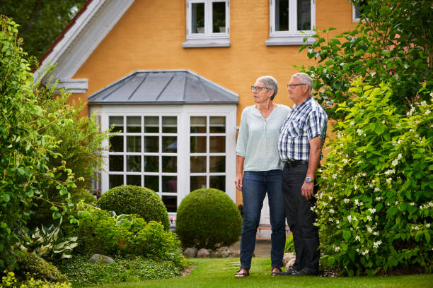 istock Retired couple's estate with park like garden 699795290