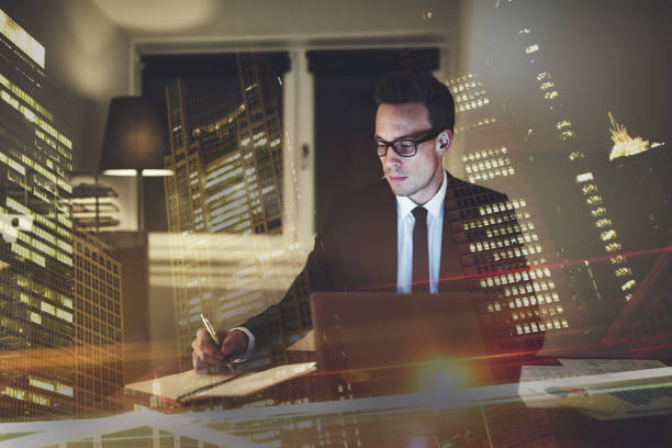 istock Serious concentrated businessman working at office 699822686