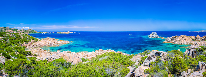 Pure clear azure sea water and amazing rocks on coast of Maddalena island, Sardinia, Italy. Wide - banner