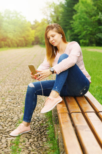 istock Young woman taking Selfie outdoors 699838100