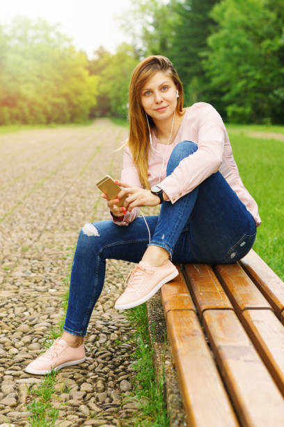 istock Young woman taking Selfie outdoors 699842568
